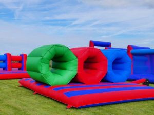 Inflatable barrel crawl assault course hire