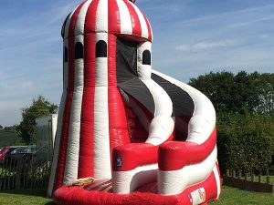 inflatable helter skelter slide hire