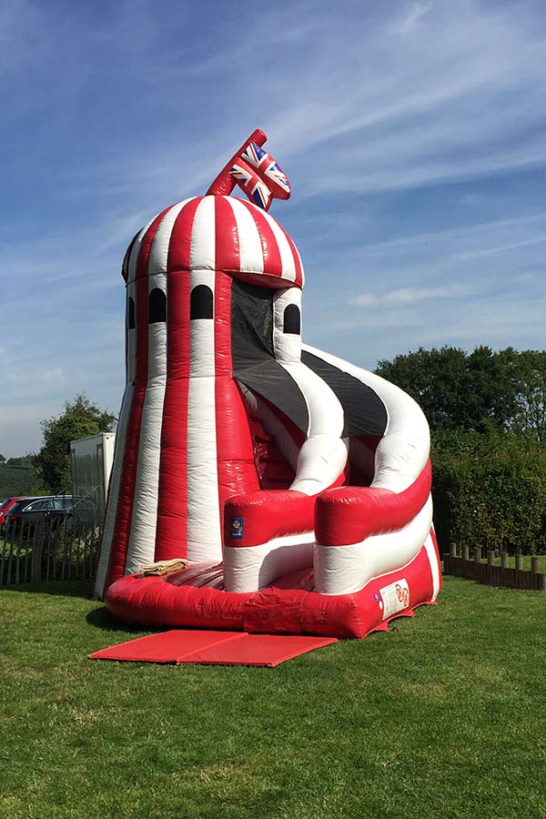 inflatable helter skelter slide hire