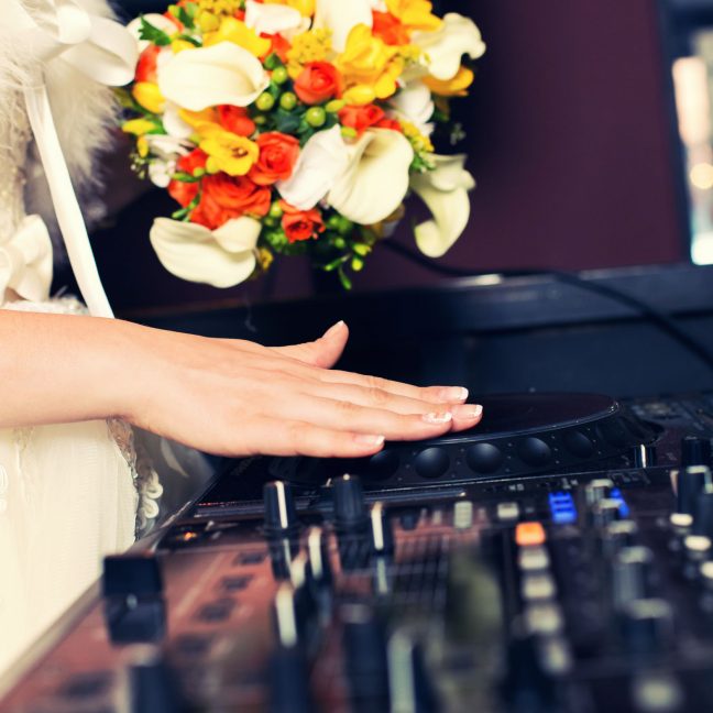 the bride the DJ at the wedding