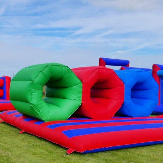 Inflatable barrel crawl assault course hire