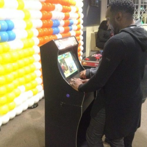 gamer playing retro arcade game